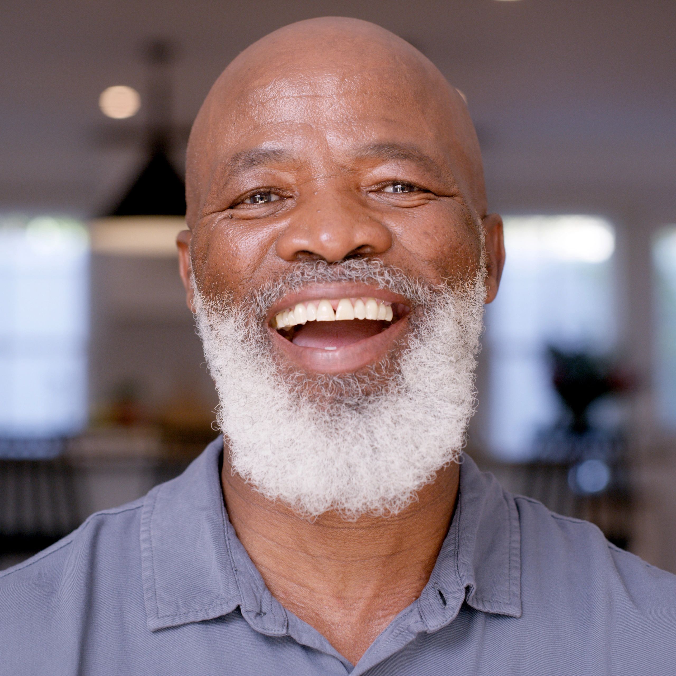 Smiling homeowner testimonial portrait
