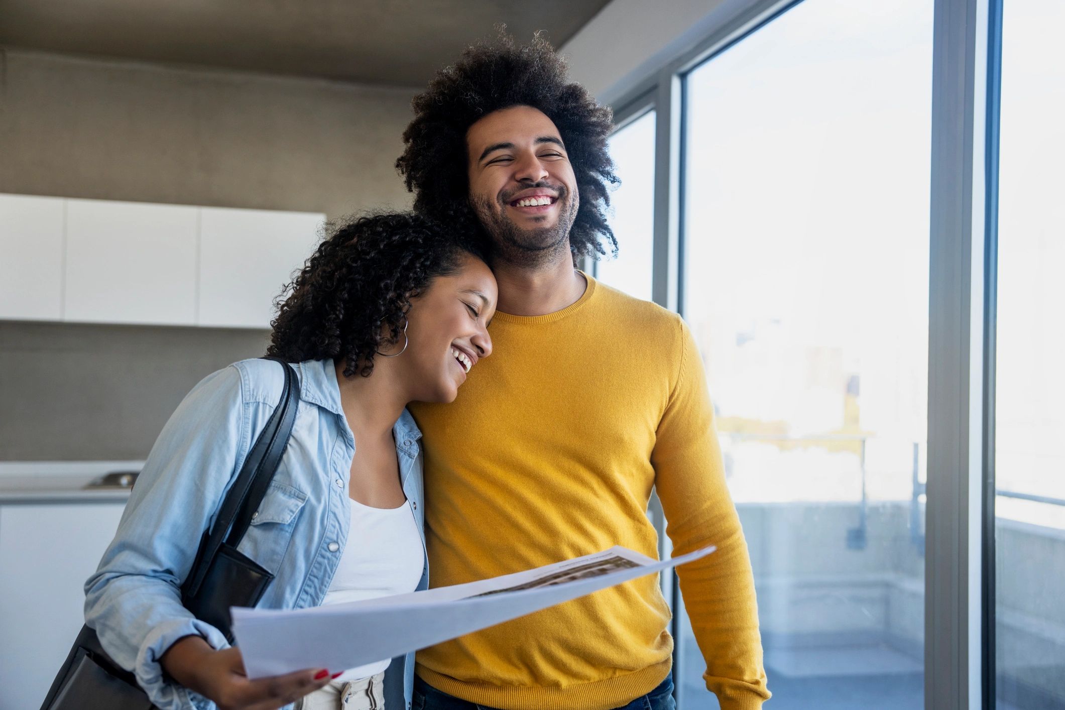 Young couple seeking an apartment for rent or buy.